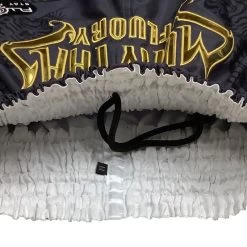 Fluory Sak Yant Tiger Muay Thai Shorts Grijs Goud MTSF98 -Boksen Winkel fluory fluory sak yant tiger muay thai shorts grij 1