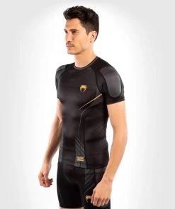 Venum Athletics Compressie T-shirt Rash Guard Zwart Goud
