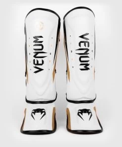 Venum Elite Evo Kickboks Scheenbeschermers Wit Goud -Boksen Winkel venum venum elite evo kickboks scheenbeschermers w 2