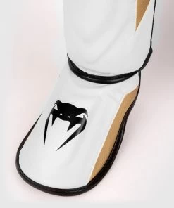 Venum Elite Evo Kickboks Scheenbeschermers Wit Goud -Boksen Winkel venum venum elite evo kickboks scheenbeschermers w 6