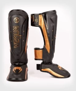 Venum Elite Evo Kickboks Scheenbeschermers Zwart Brons -Boksen Winkel venum venum elite evo kickboks scheenbeschermers z 3
