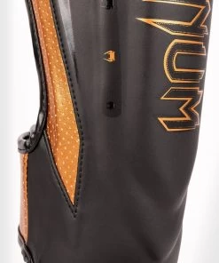 Venum Elite Evo Kickboks Scheenbeschermers Zwart Brons -Boksen Winkel venum venum elite evo kickboks scheenbeschermers z 4