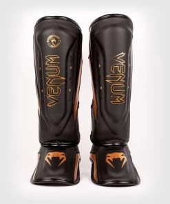 Venum Elite Evo Kickboks Scheenbeschermers Zwart Brons -Boksen Winkel venum venum elite evo kickboks scheenbeschermers z 6