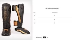 Venum Elite Evo Kickboks Scheenbeschermers Zwart Brons -Boksen Winkel venum venum elite evo kickboks scheenbeschermers z 7