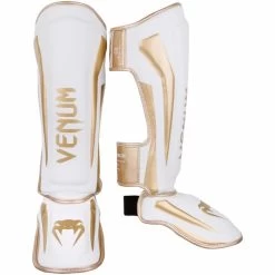Venum Kickboks Scheenbeschermers Elite Wit Goud -Boksen Winkel venum venum kickboks scheenbeschermers elite wit g 1