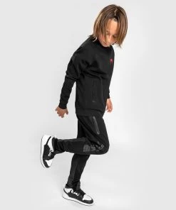 Venum OKINAWA 3.0 Joggers Kids Zwart Rood -Boksen Winkel venum venum okinawa 30 joggers kids zwart rood 4