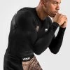 Venum Reorg Rash Guard Lange Mouwen Zwart 1 Venum Reorg Rash Guard Lange Mouwen Zwart -Boksen Winkel venum venum reorg rash guard lange mouwen zwart